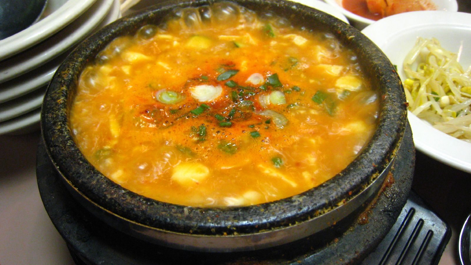 Sundubu jjigae soft tofu stew in a red broth