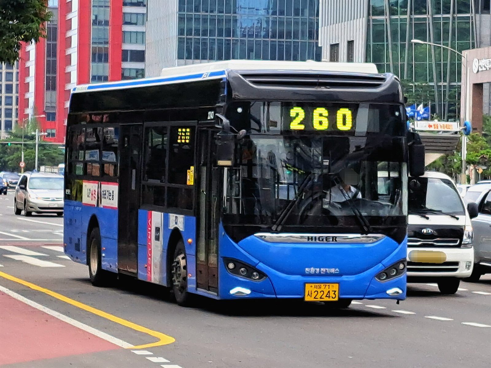 Blue Seoul city bus stopped on a street in Seoul