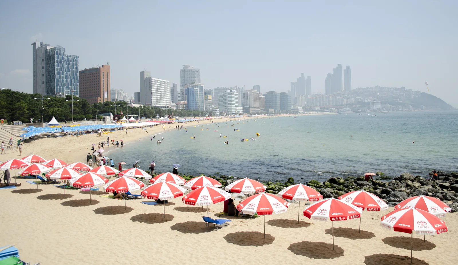 Haeundae Beach in Busan with city buildings behind the sand