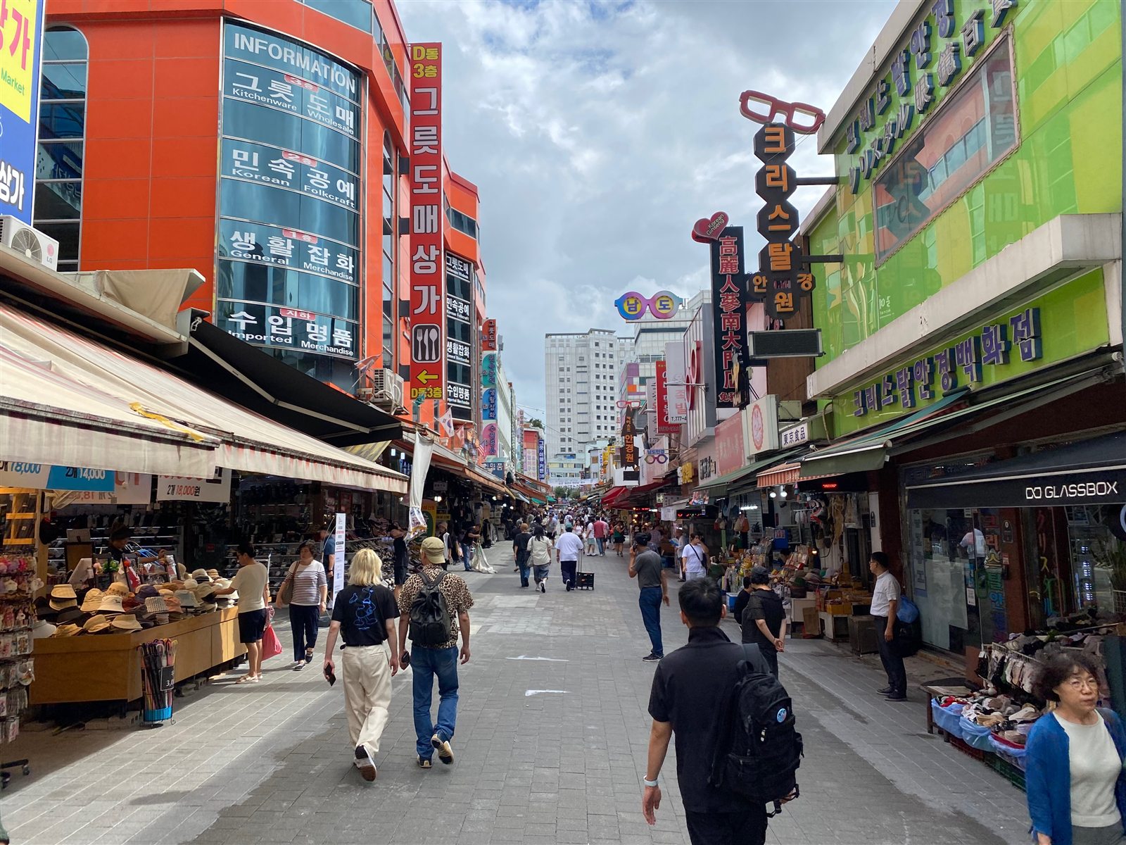 Shops and product displays along Namdaemun Market shopping street
