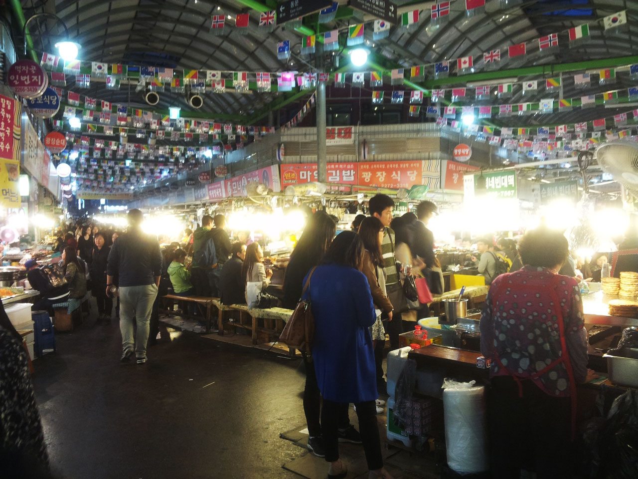 Indoor walkway and stalls at Gwangjang Market in Seoul