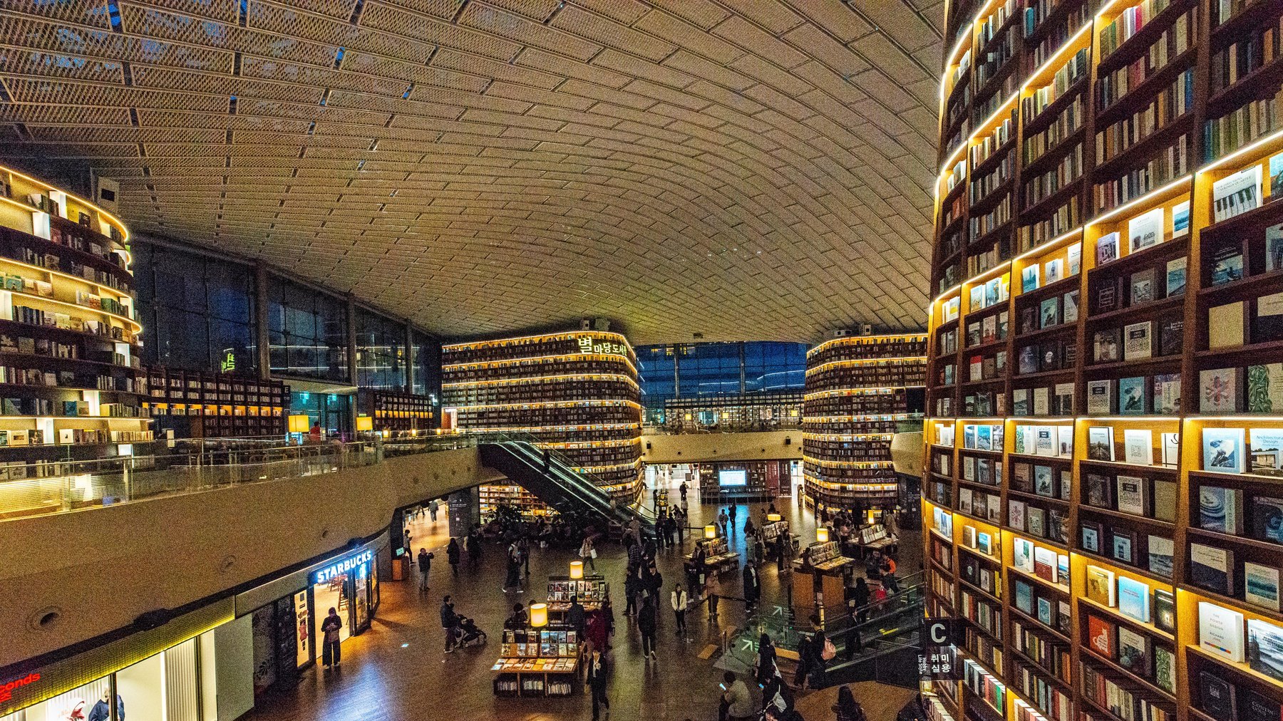 Starfield Library inside COEX Mall in Gangnam with tall bookshelves and visitors
