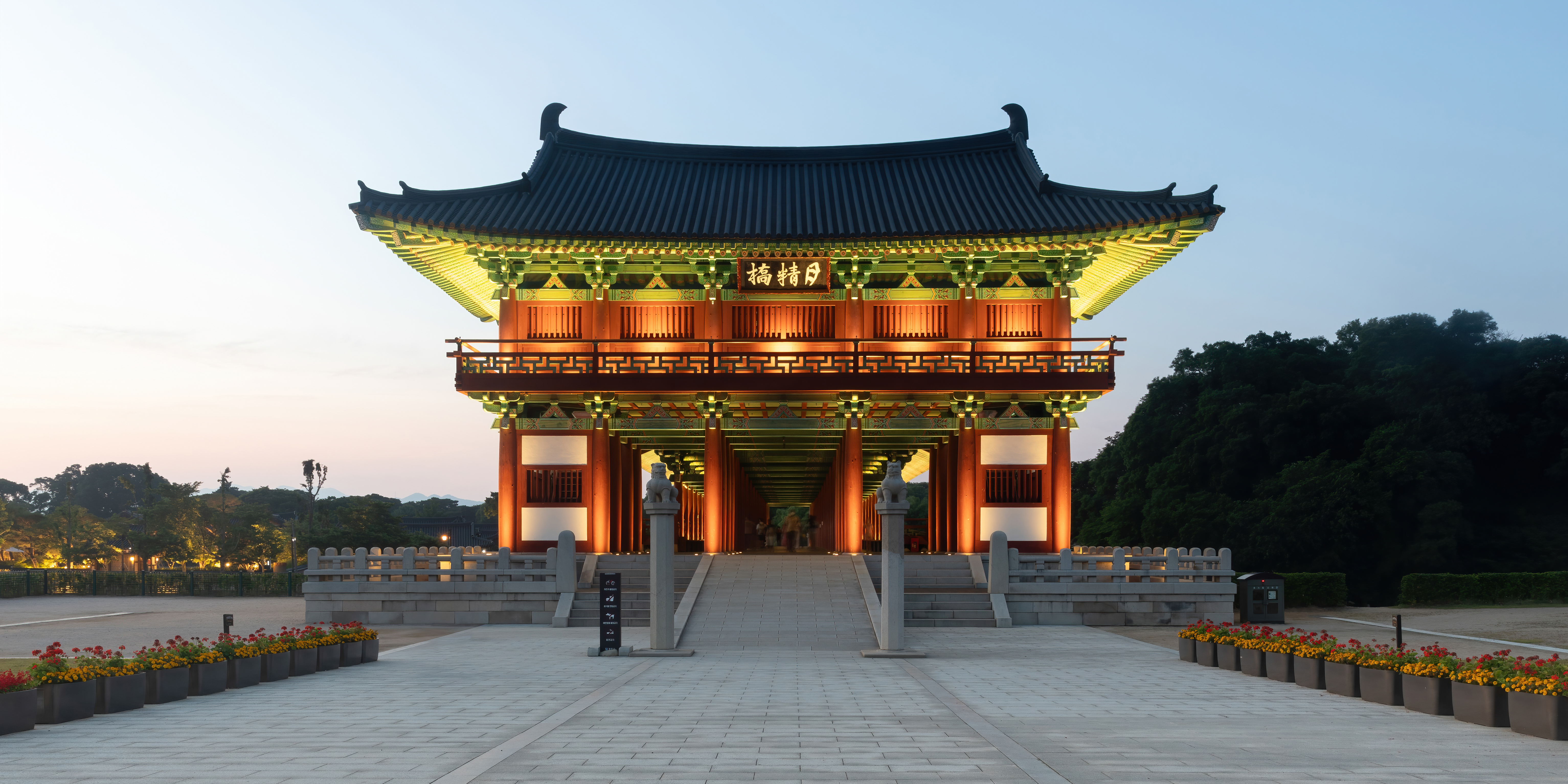 Woljeonggyo Bridge illuminated at sunset.