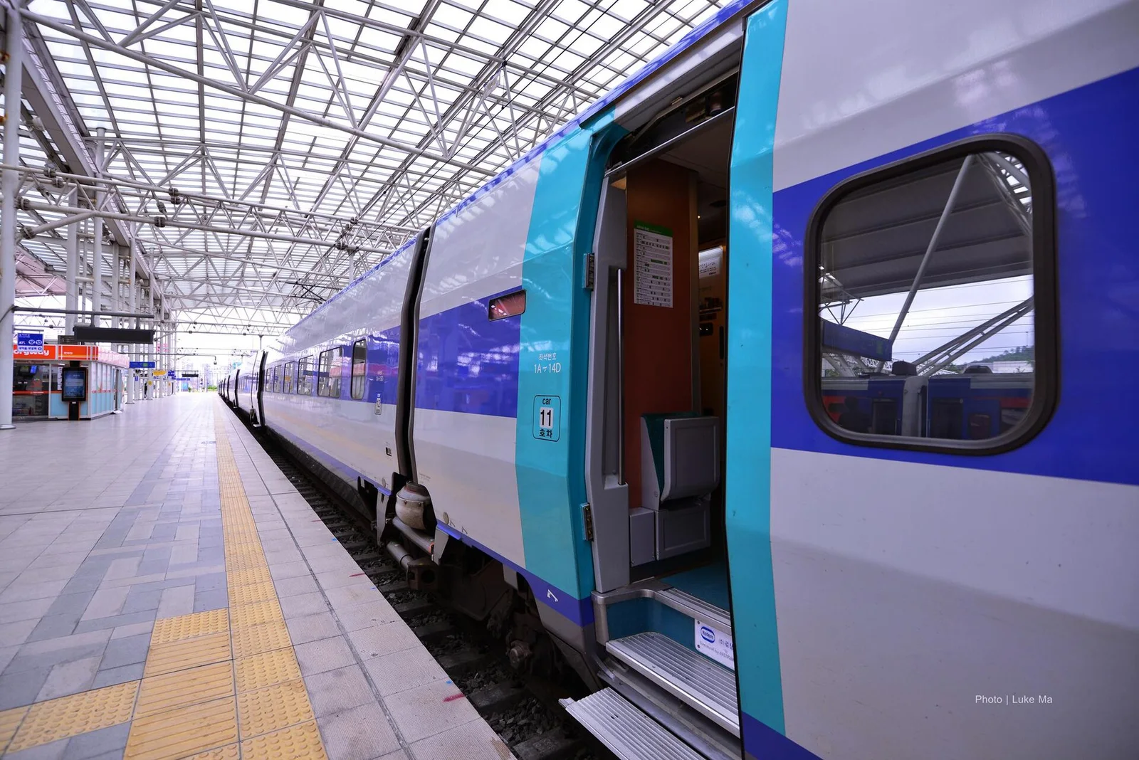 KTX-I train with an open passenger door at Seoul Station platform