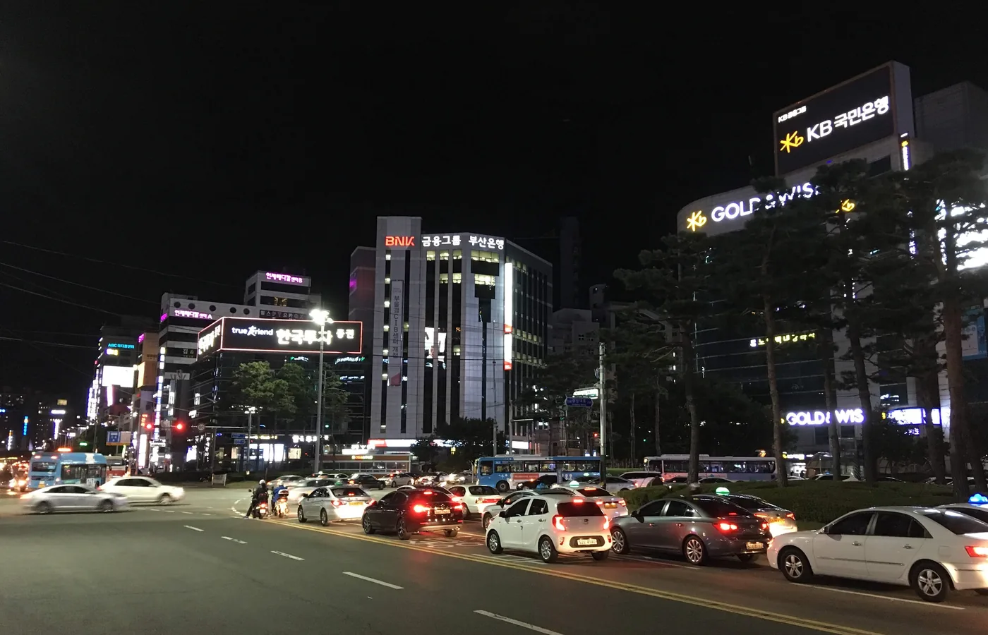 Seomyeon Rotary in Busan at night with city lights and traffic