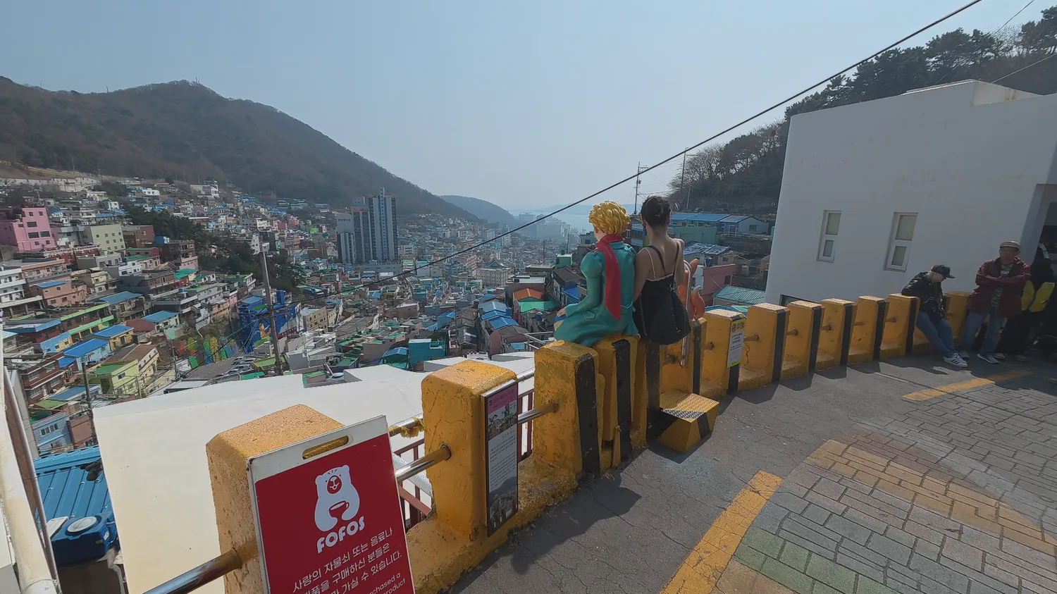 Little Prince photo spot overlooking Gamcheon Culture Village and the surrounding hills.